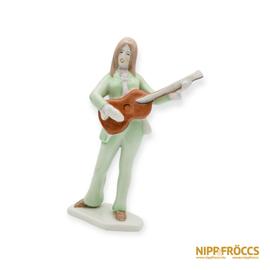 Aquincumi porcelán - Gitározó hippi lány