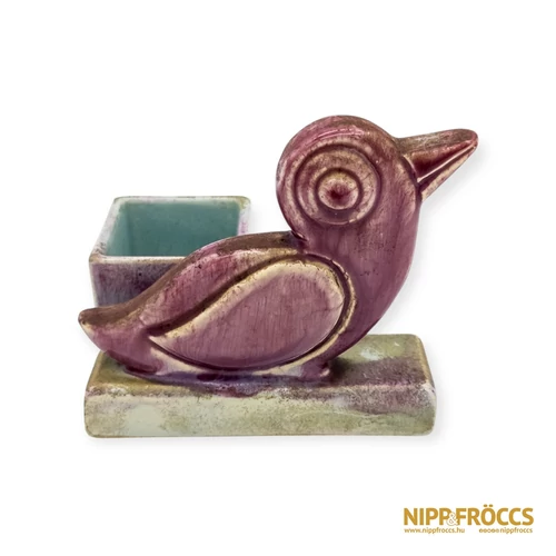 Hamutartó madár figurával