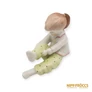Kép 2/10 - Aquincumi porcelán -  Nadrágot húzó kislány (ritka festésű)