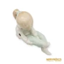 Kép 9/10 - Aquincumi porcelán -  Nadrágot húzó kislány